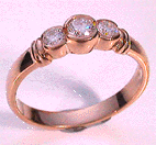three stone rubset gold ring