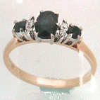 three sapphire claw setting glold ring
