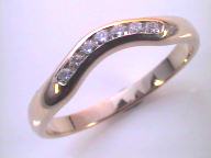 seven diamond curved ring