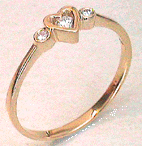heart three stone gold ring